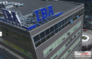 A rooftop advertising structure with the logo of 